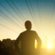 Electrical engineer looking sunset Electrical engineer looking sunset